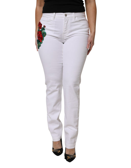 Vaqueros femeninos con lentejuelas y flores blancas de Dolce &amp; Gabbana