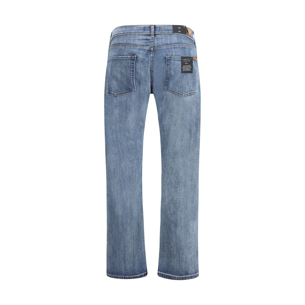 Blue cotton straight-leg jeans with dark wash and subtle fading.