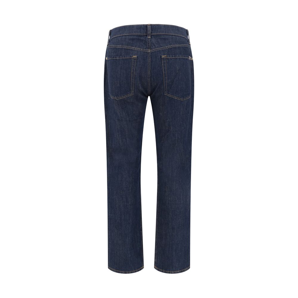 Close-up of blue cotton straight-leg jeans with a relaxed fit and classic design.