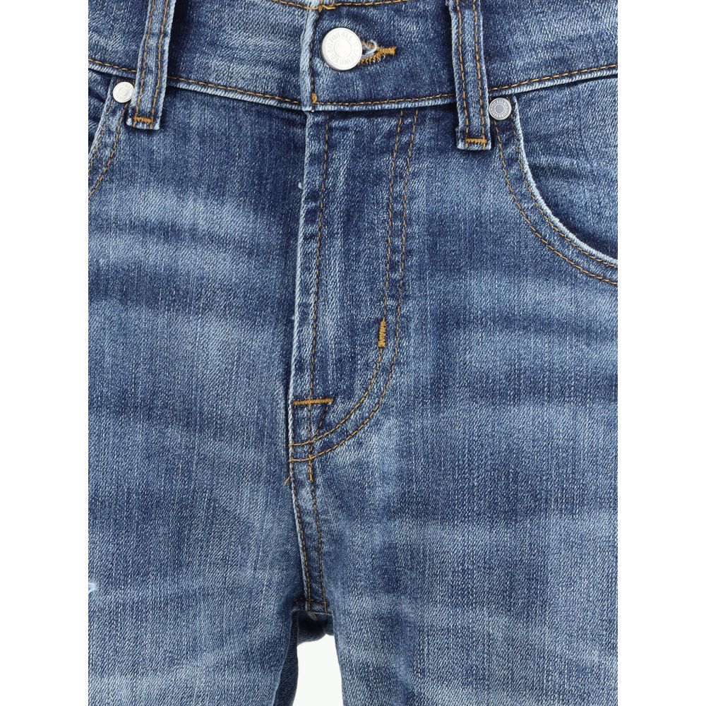 Blue cotton straight-leg jeans with dark wash and subtle fading.