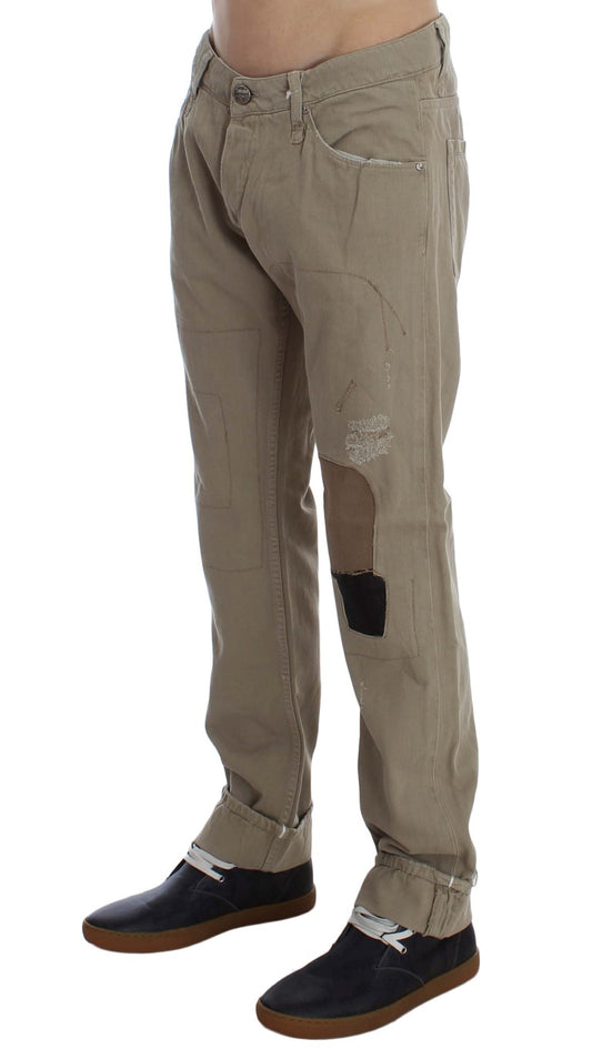 Pair of men's jeans with holes in knees