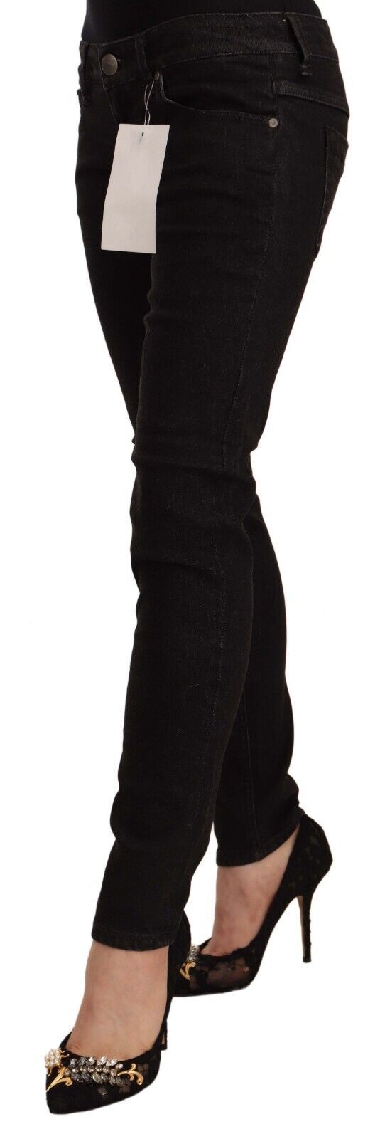 Woman wearing black pants and heels