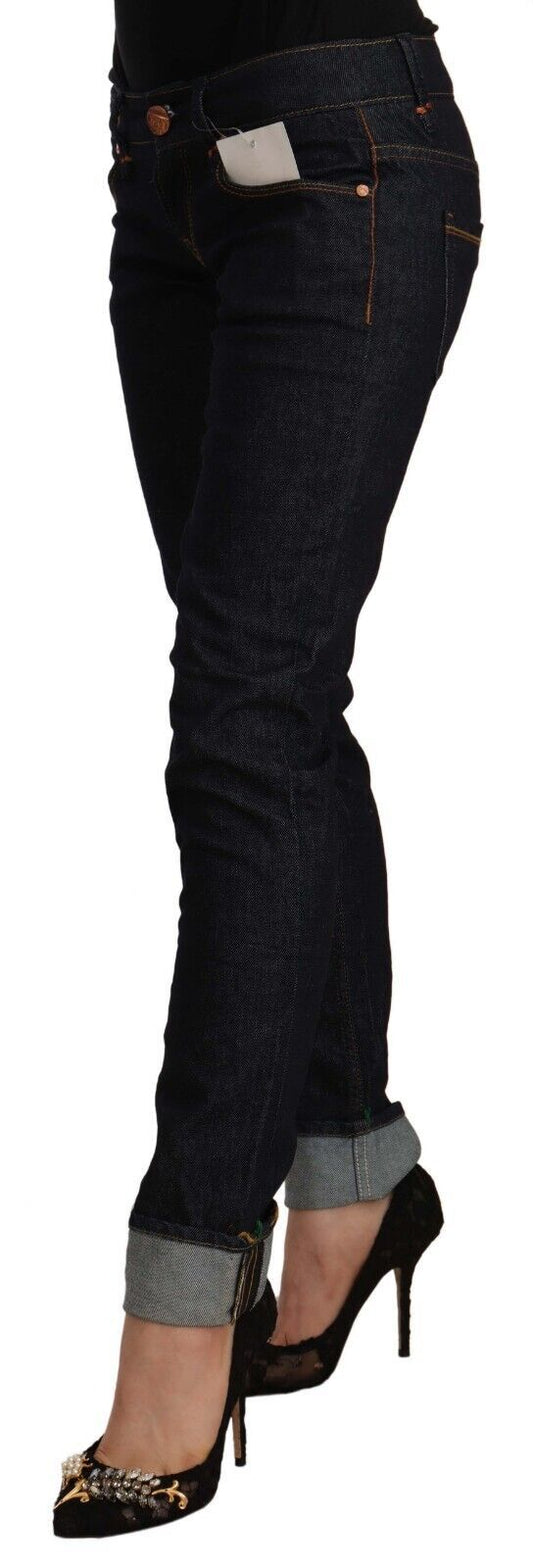 Woman wearing blue jeans and black high heels