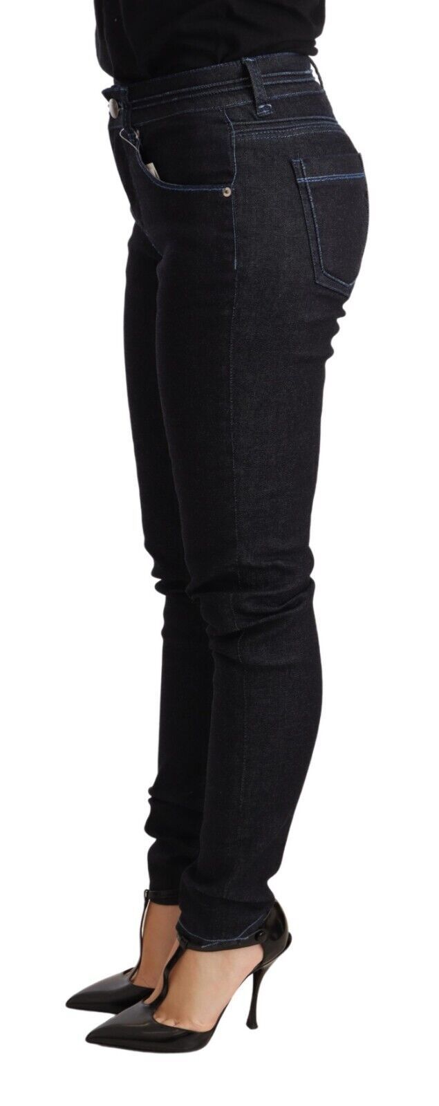Woman wearing black pants and heels