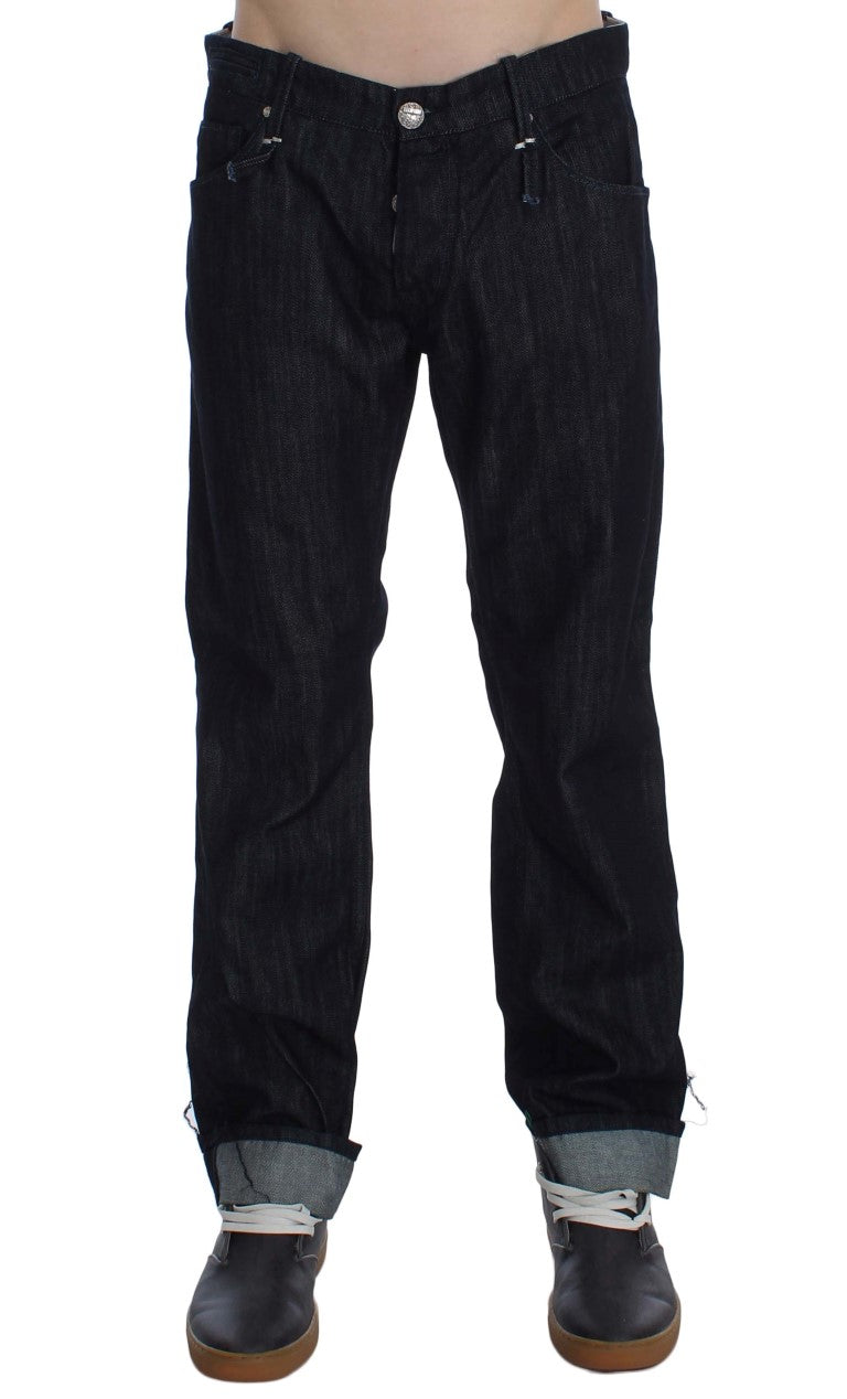 Pair of dark blue jeans with button closure