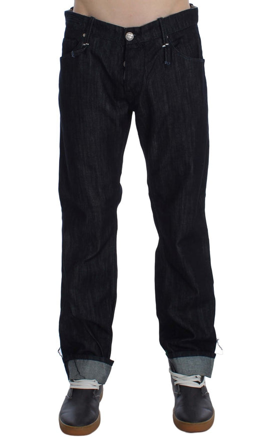 Pair of dark blue jeans with button closure