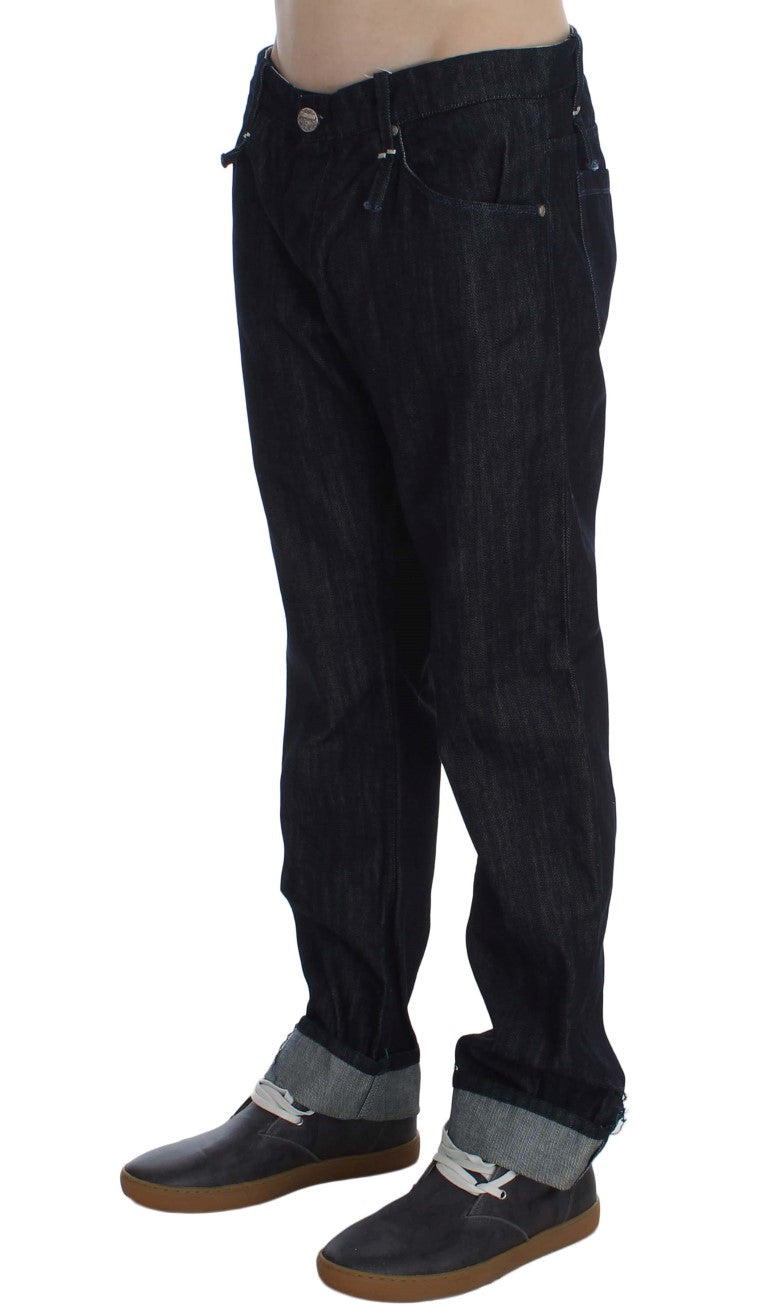 Pair of dark blue jeans with zipper fly