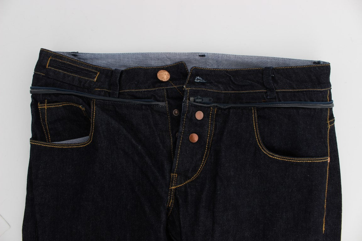 Pair of dark blue denim jeans with button closure