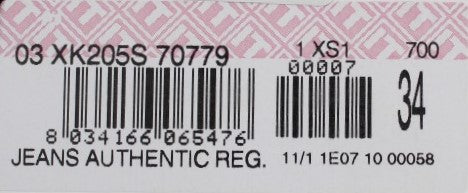 Pink and white label on clothing item