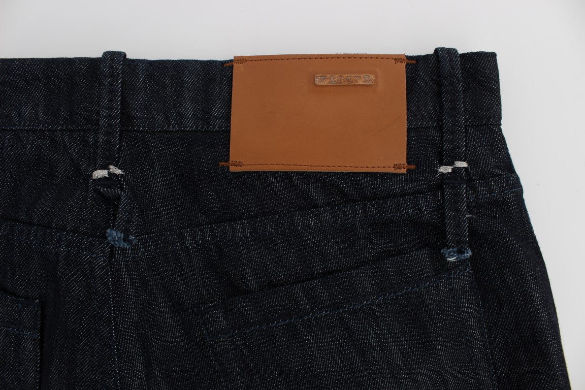 Pair of dark denim jeans with a brown leather wallet in the front pocket