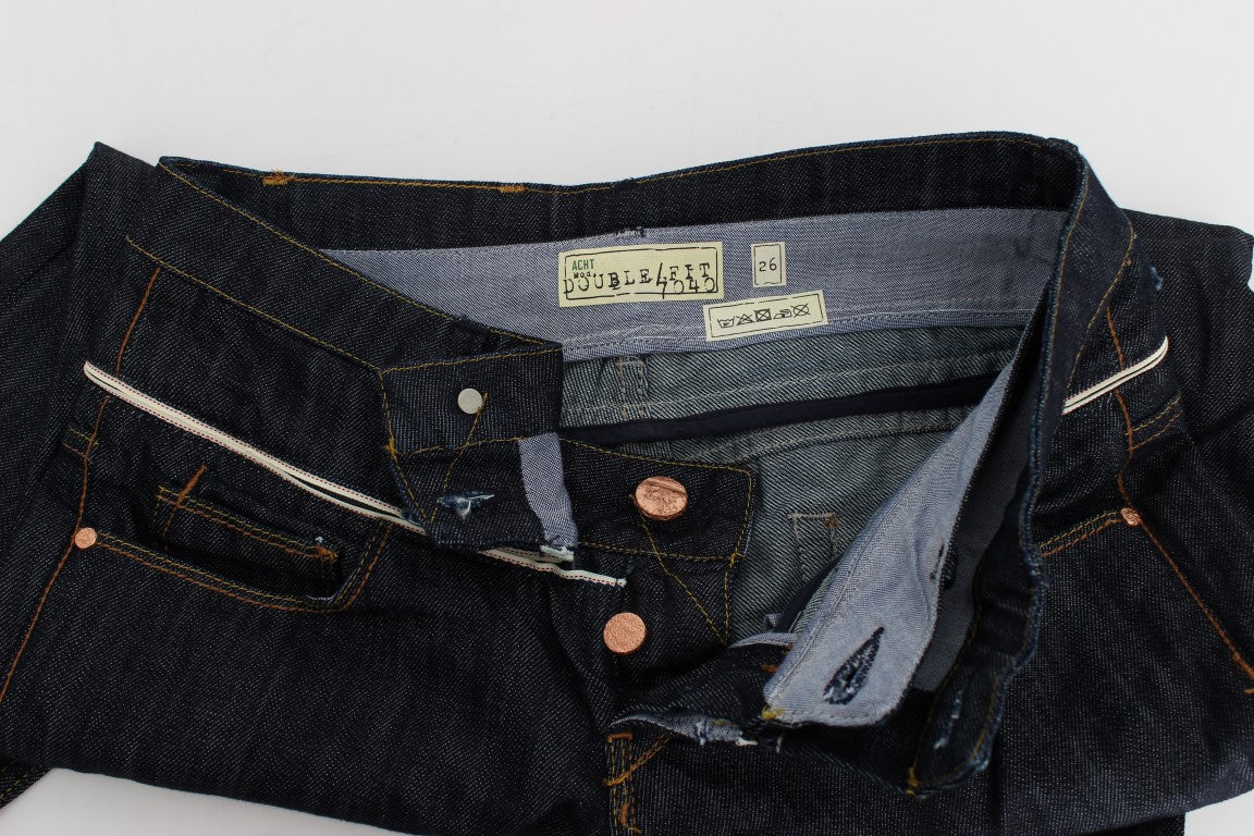 Pair of blue jeans with copper rivets on front