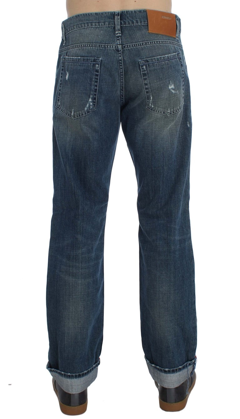 Pair of blue denim jeans with brown belt loops