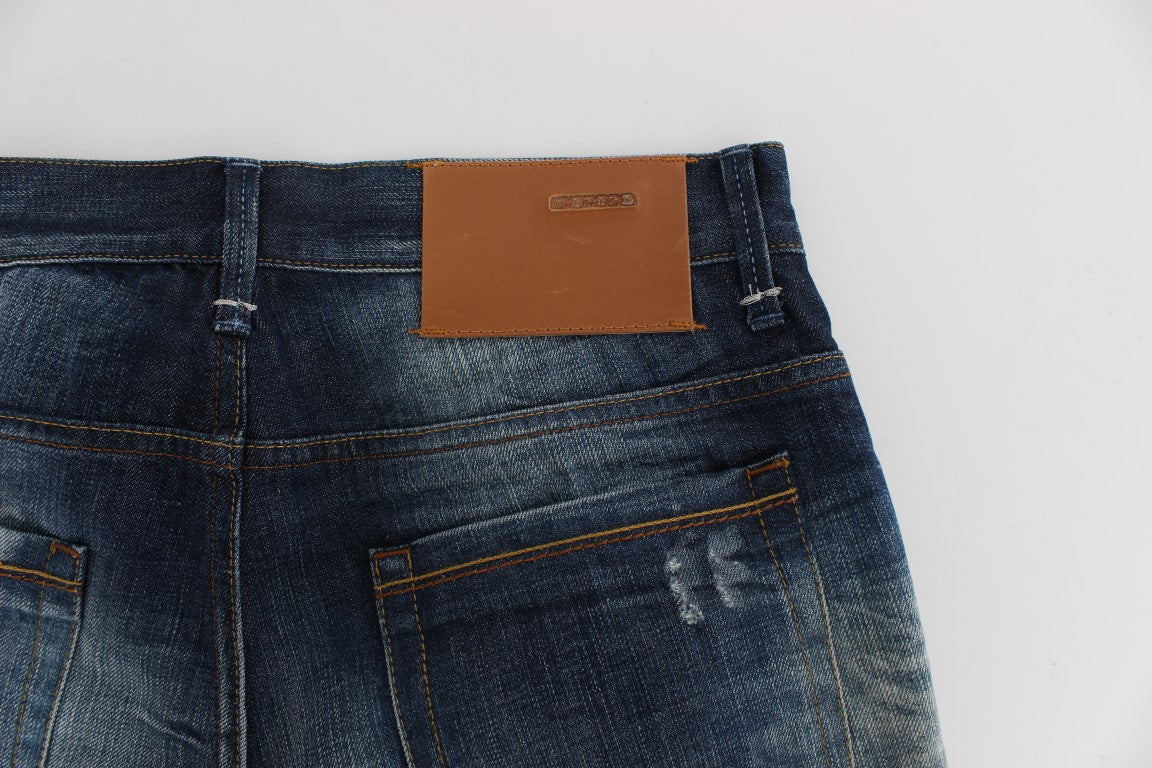 Pair of blue denim jeans with brown leather patch on back
