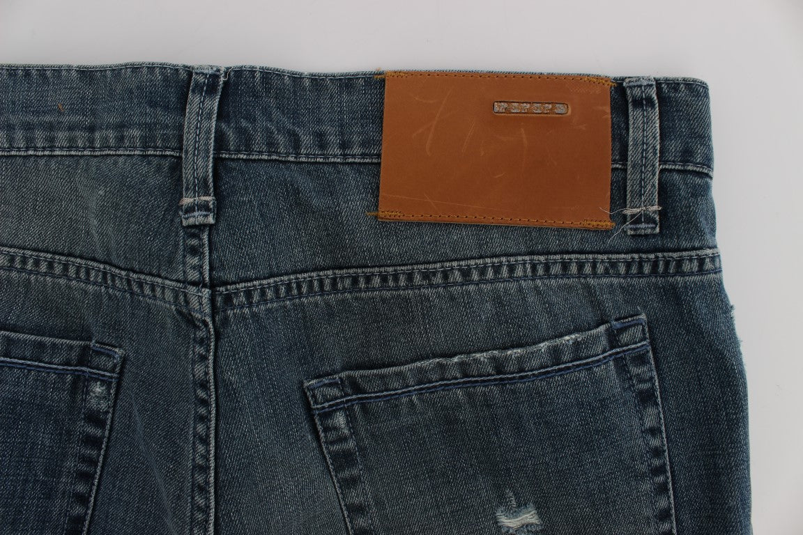 Pair of blue jeans with brown leather patch on back pocket