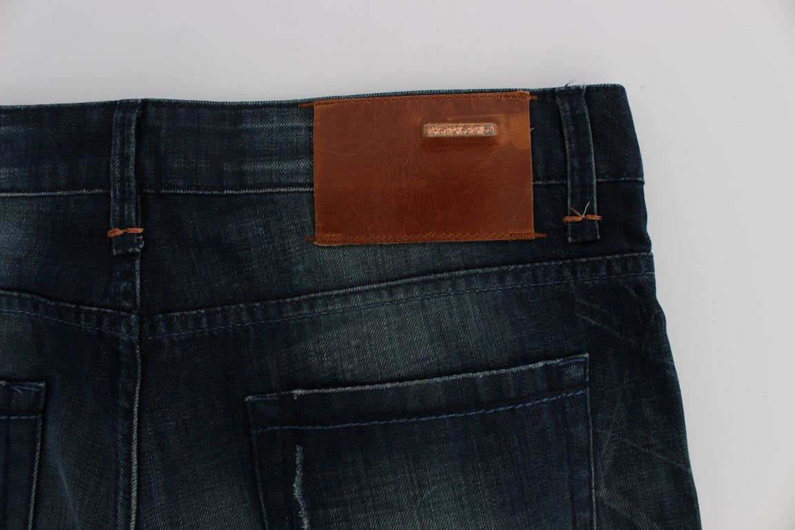 Pair of blue jeans with brown leather patch on waistband