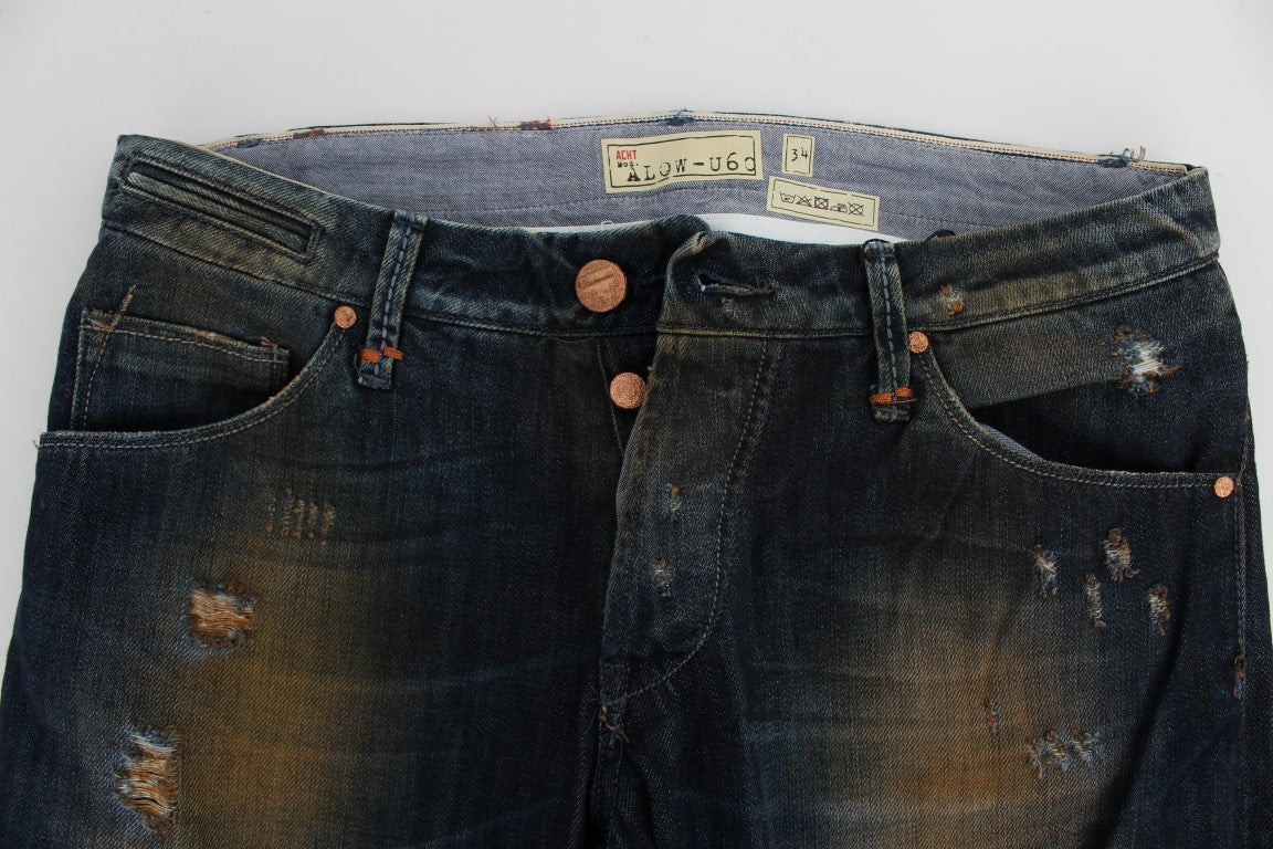 Pair of distressed blue jeans with button closure