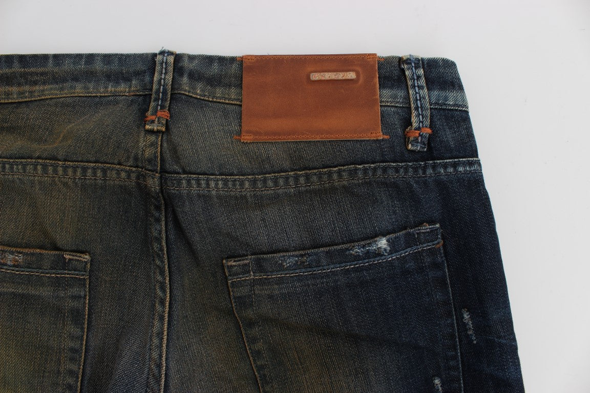 Pair of blue jeans with brown leather patch on back pocket