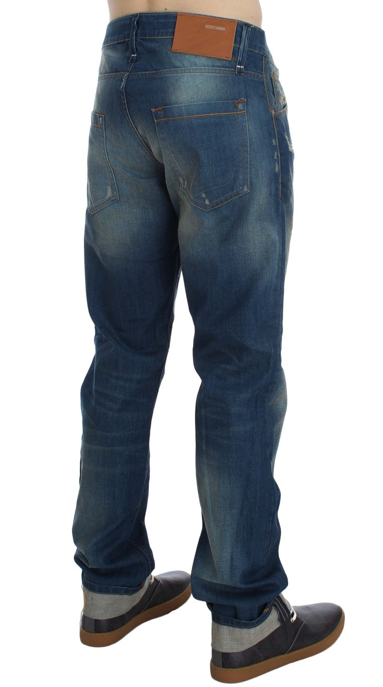 Pair of blue jeans with brown stitching on waistband