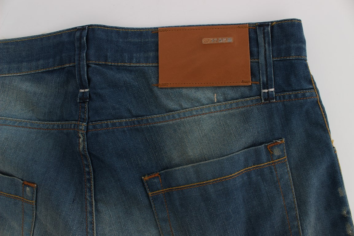 Pair of blue jeans with brown leather patch on back