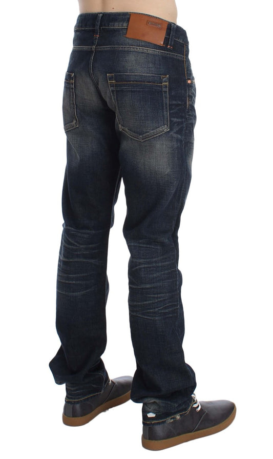 Pair of blue denim jeans with brown belt loops