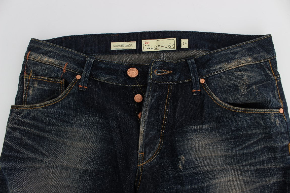 Pair of blue denim jeans with copper rivets on buttons