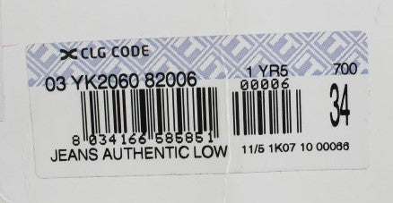 White label on blue background with black barcode and serial number