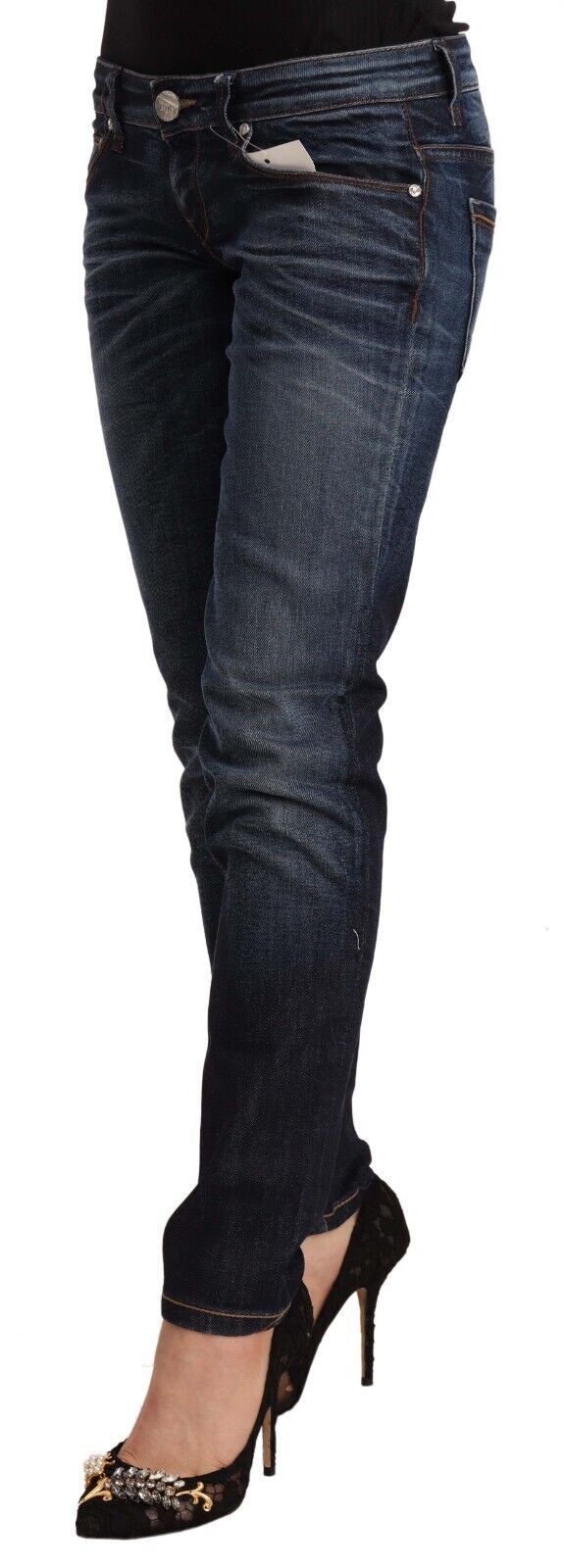 Woman wearing blue jeans and black heels
