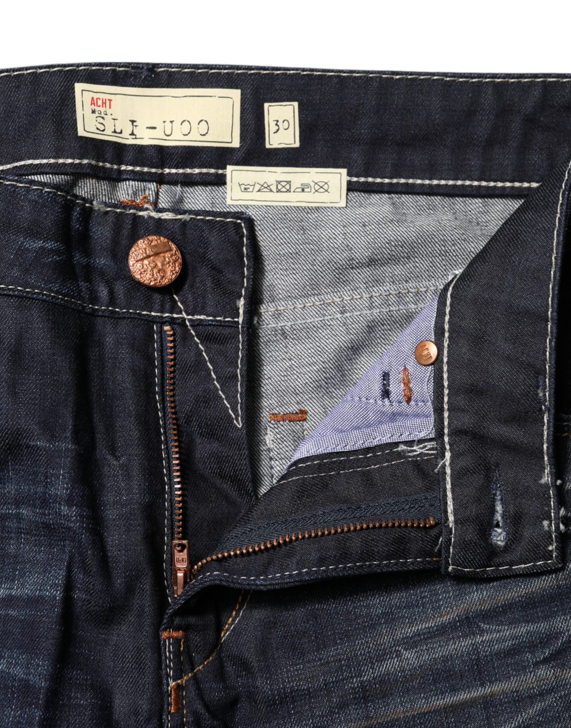 Pair of blue jeans with copper buttons