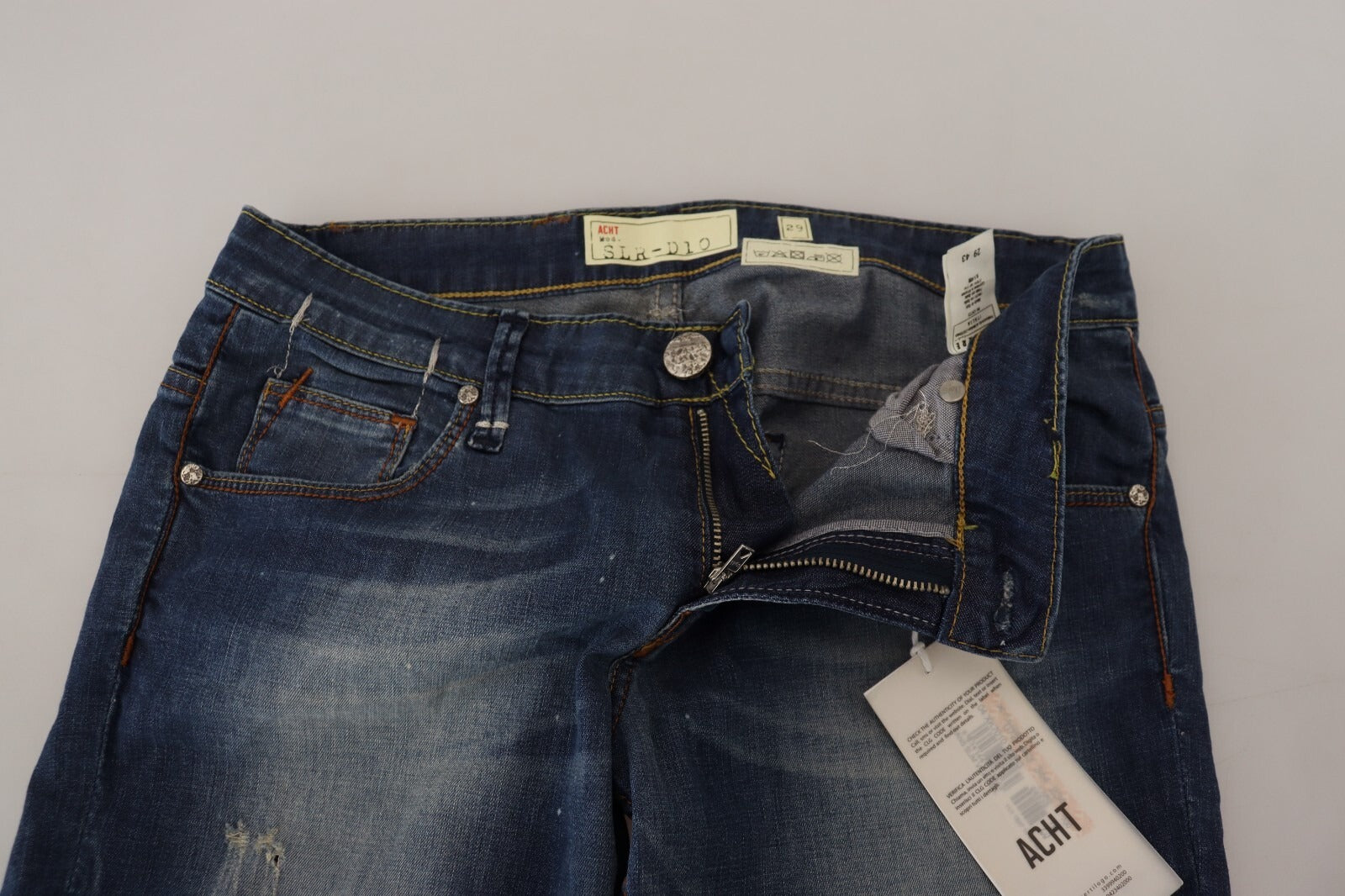 Blue denim jeans on a white background