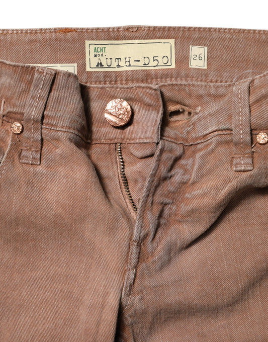 Pair of brown jeans with button closure