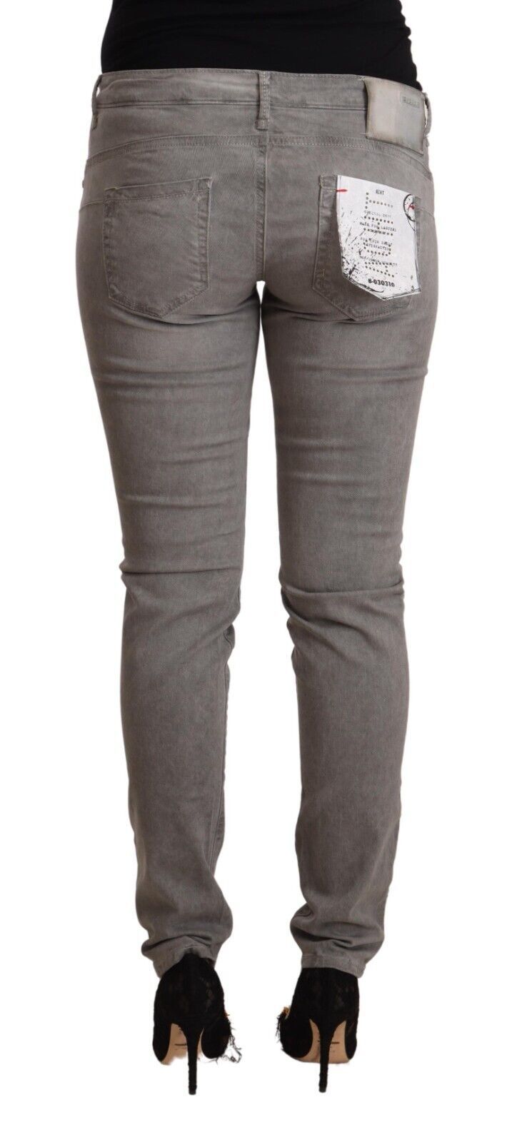 Pair of women's jeans with distressed design on back