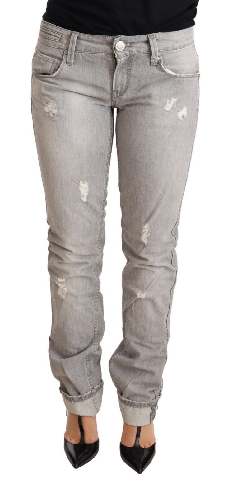 Woman wearing distressed jeans
