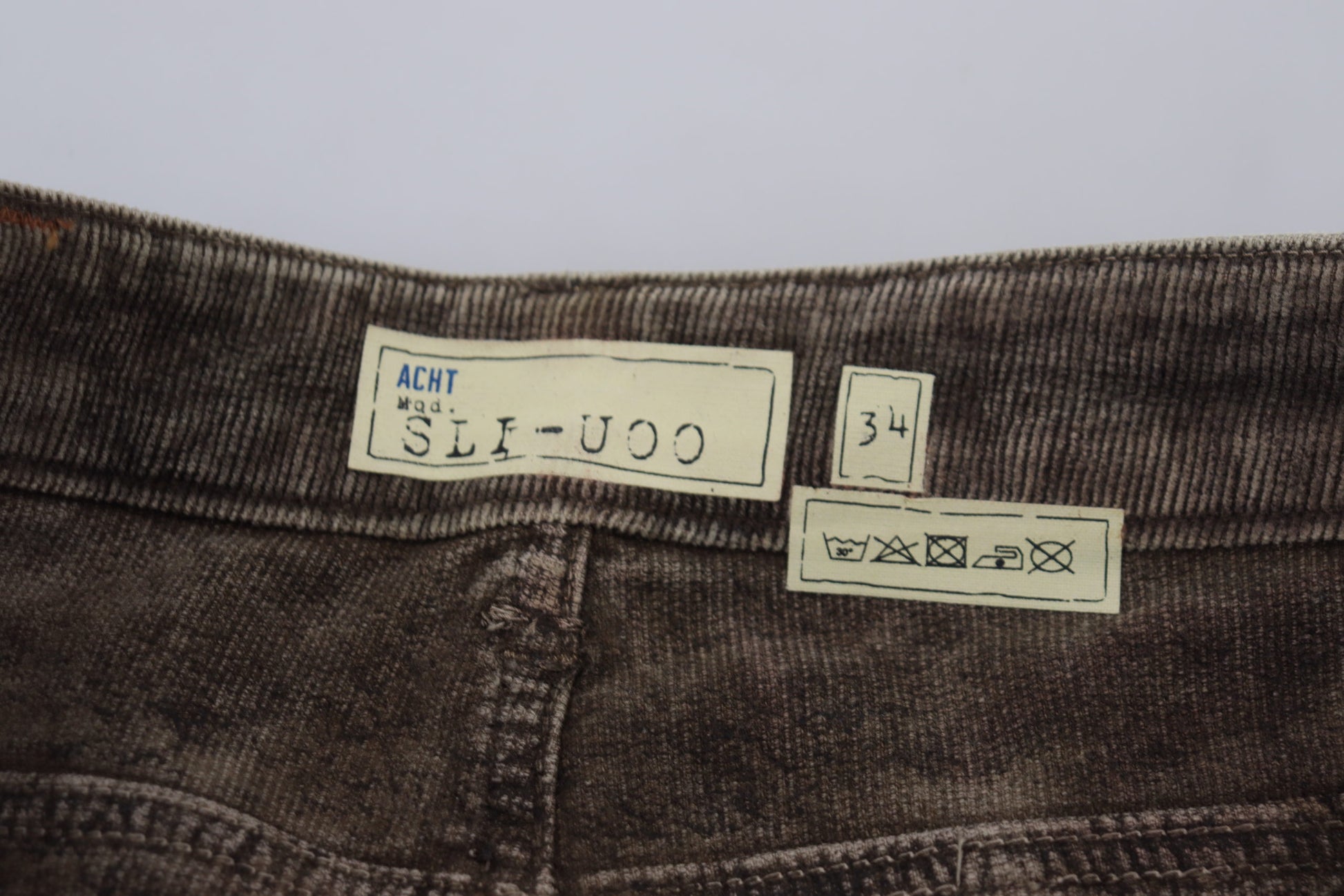 Pair of jeans with size label on waistband