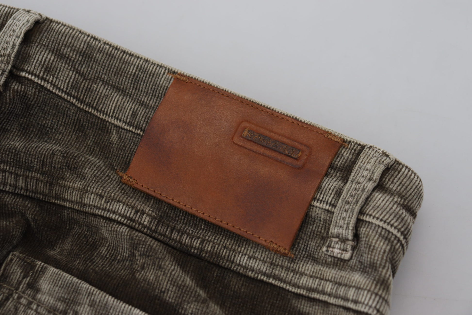 Brown leather wallet in jeans pocket
