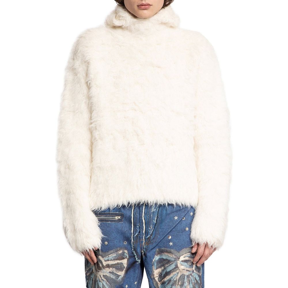 Furry white coat worn by a model