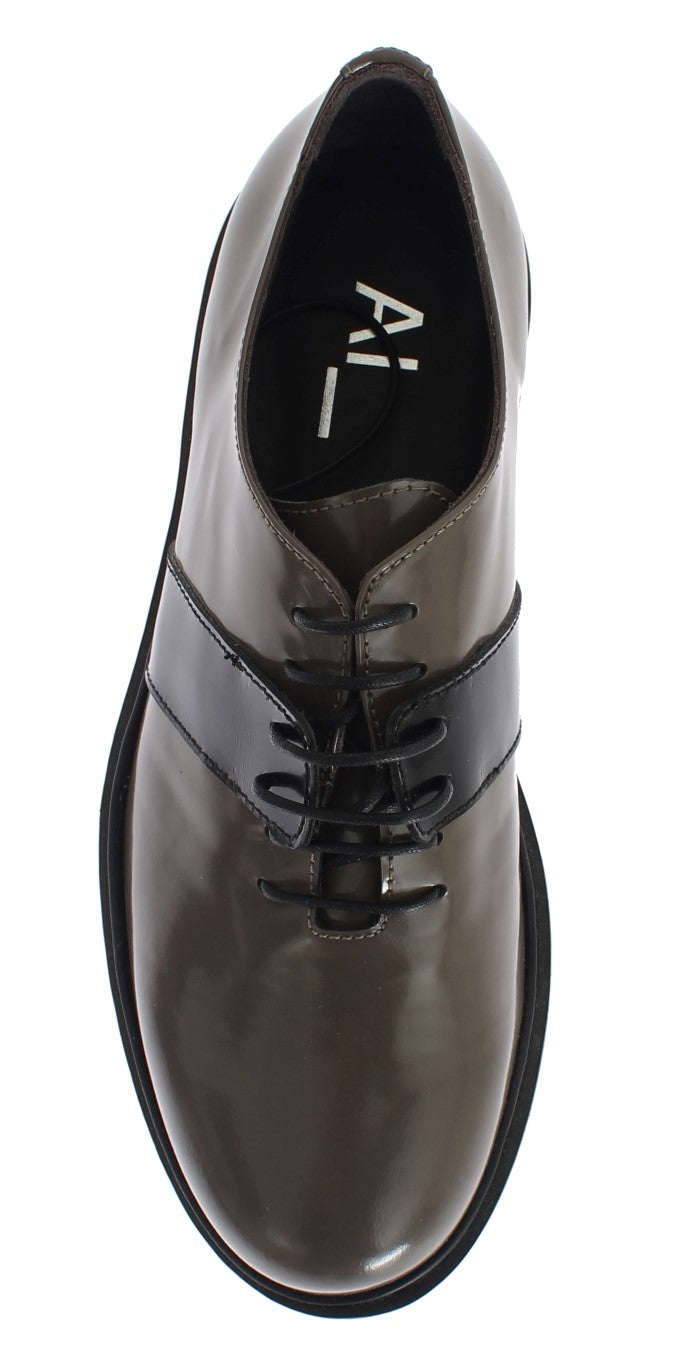 Men's dress shoe with laces and a small heel