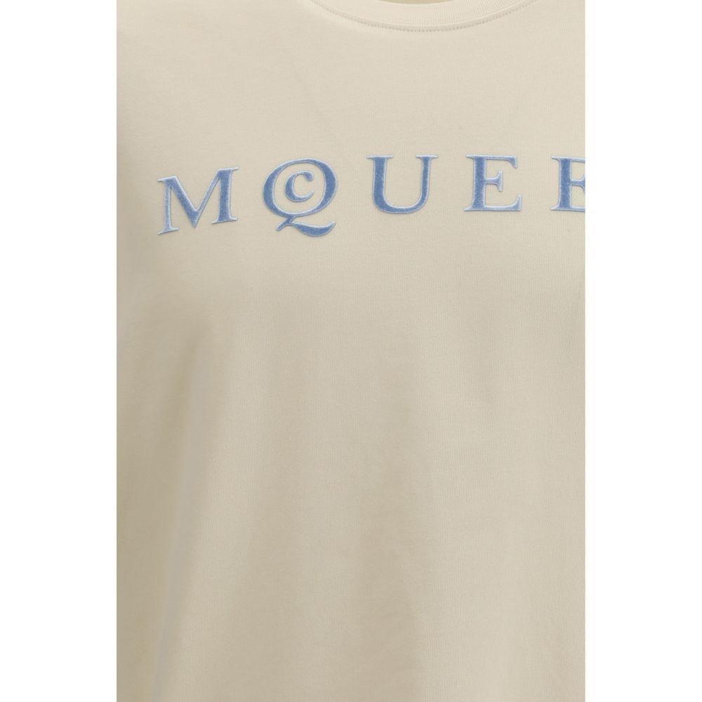 A beige cotton t-shirt with a logo on the front