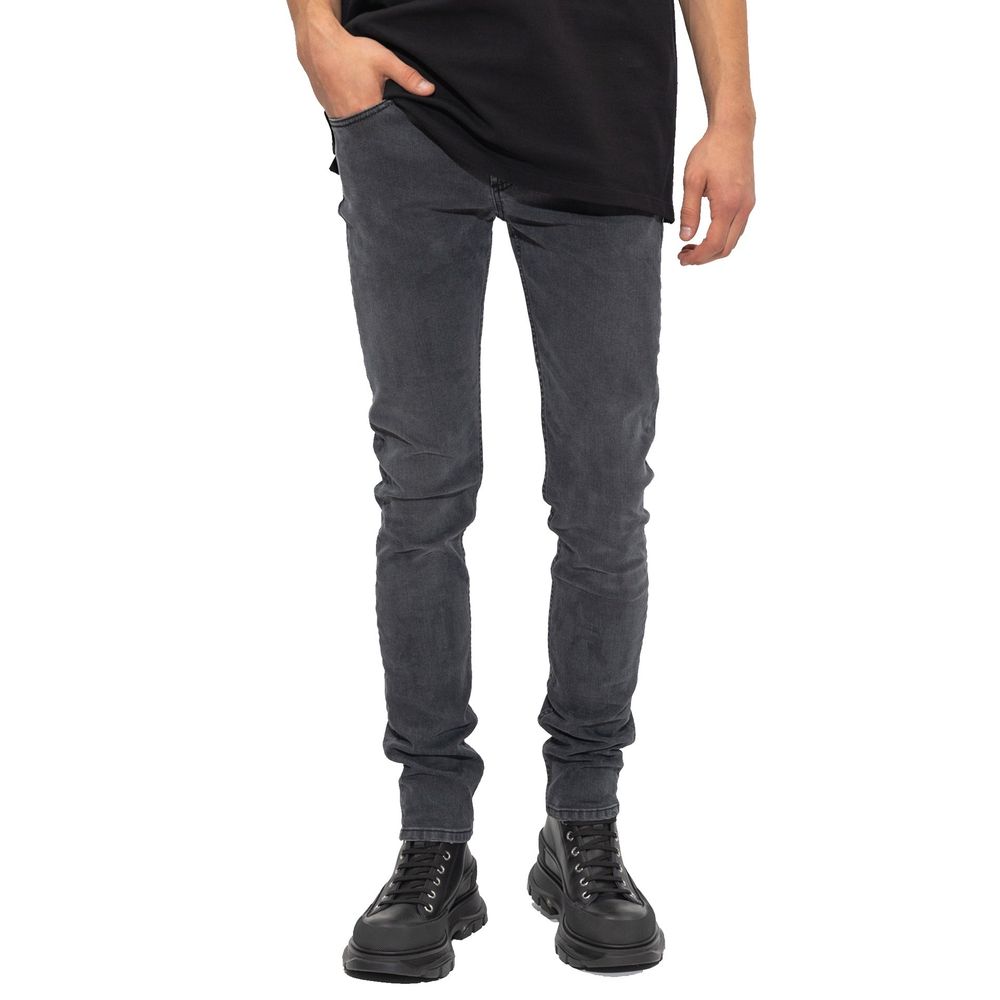 Pair of dark blue skinny jeans