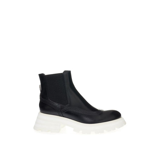 Black boot with white sole and laces