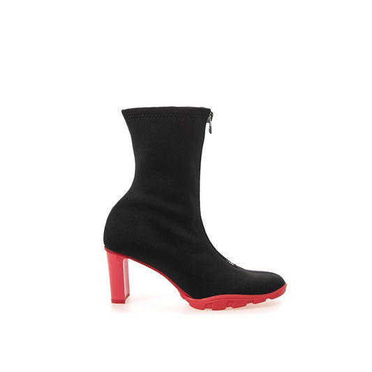 Black knee high boot with red heel