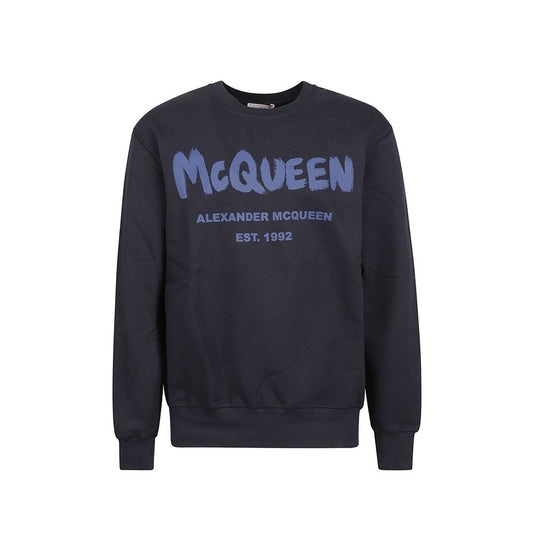 Blue sweatshirt with "McQueen" written in blue letters