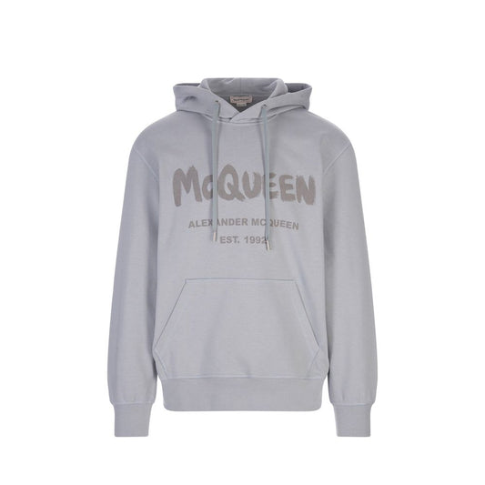 Grey hoodie with brand name on front