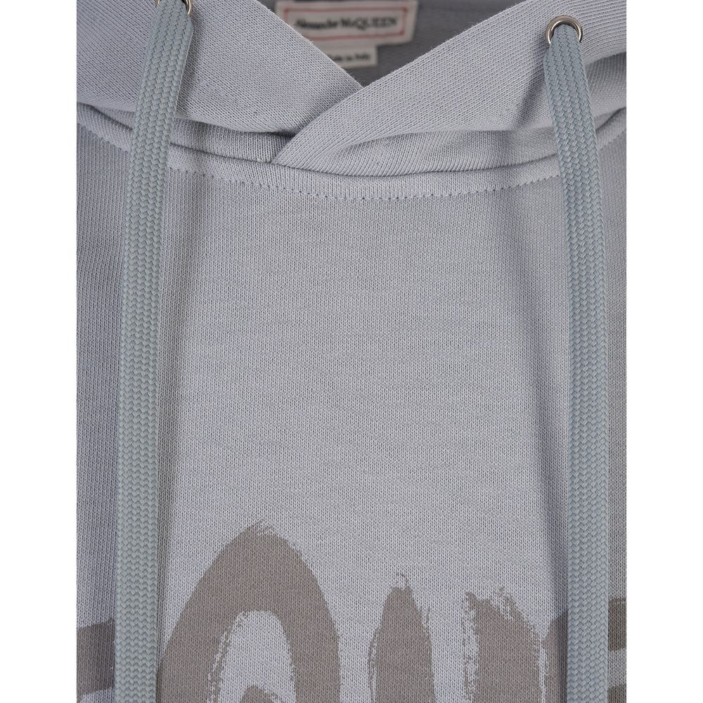 Grey hoodie with white lettering on front