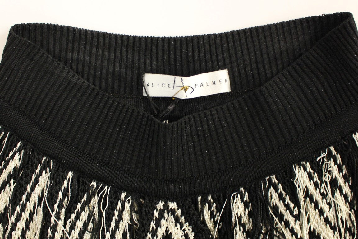 Black knitted sweater with fringe details