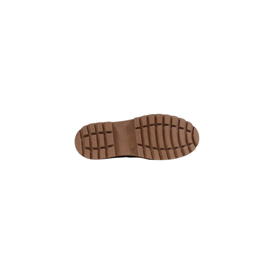 Brown shoe sole on white background