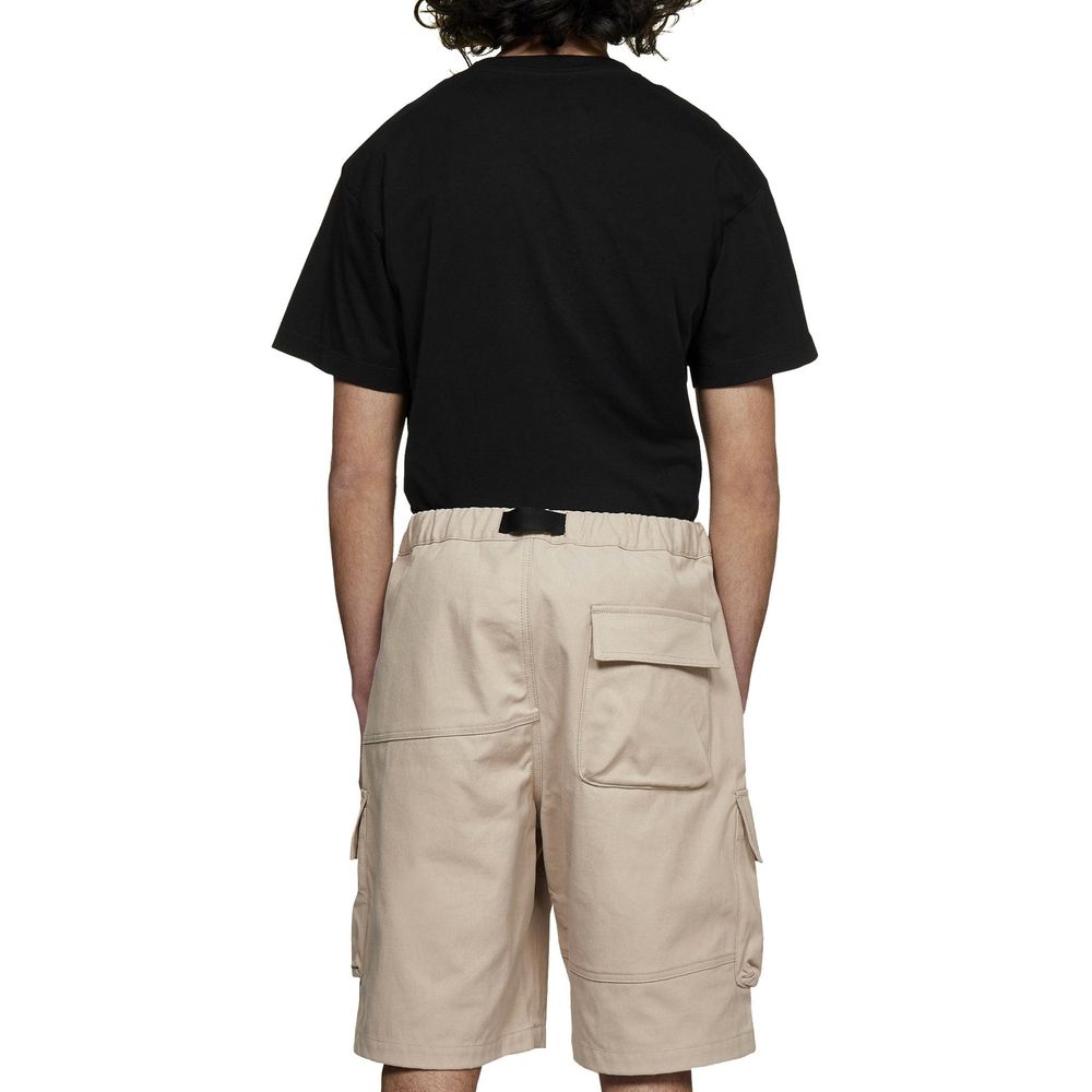 Man wearing black shirt and tan cargo shorts