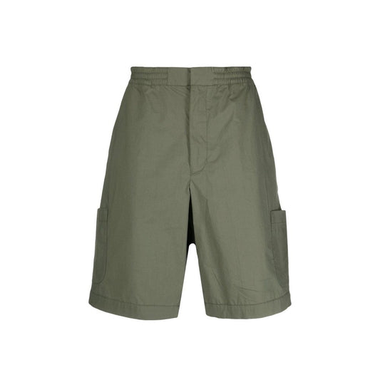 Shorts are olive green, cargo style with pockets on sides