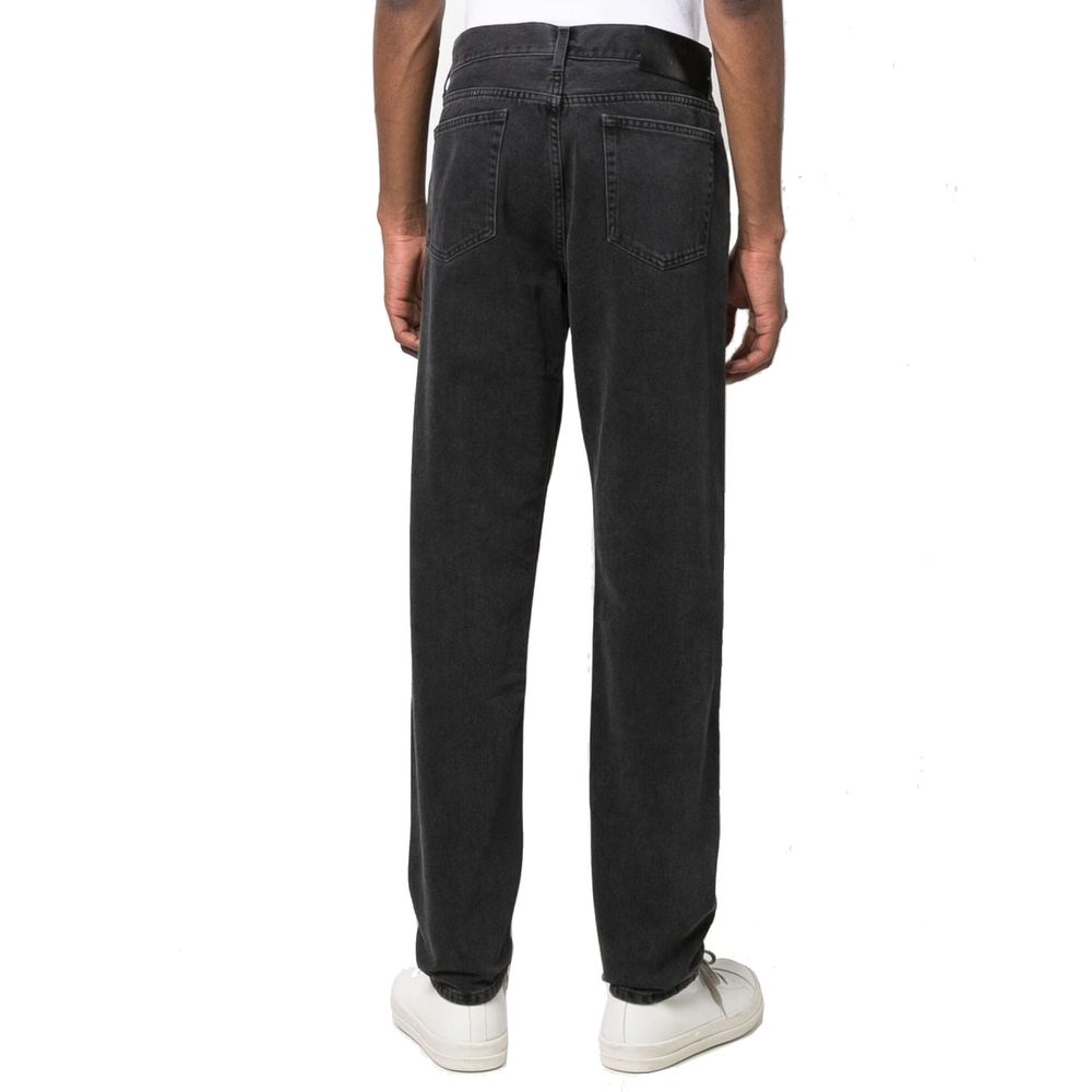 Pair of dark blue jeans on a mannequin