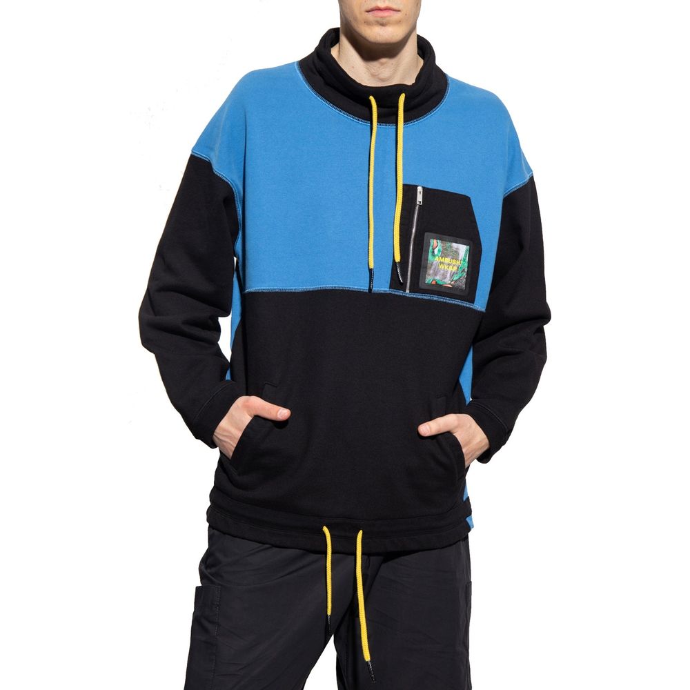 Blue hoodie with yellow zipper and pocket on front