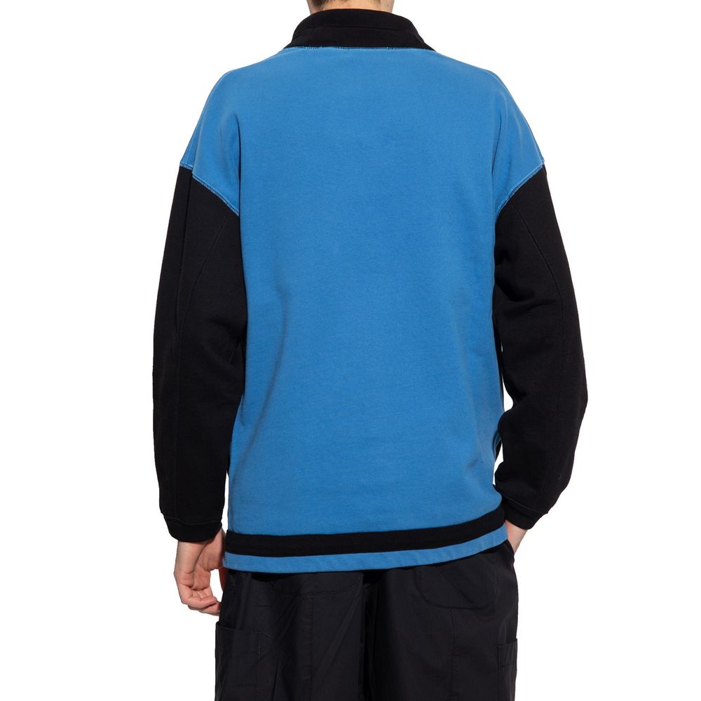 Blue jacket with black trim on back